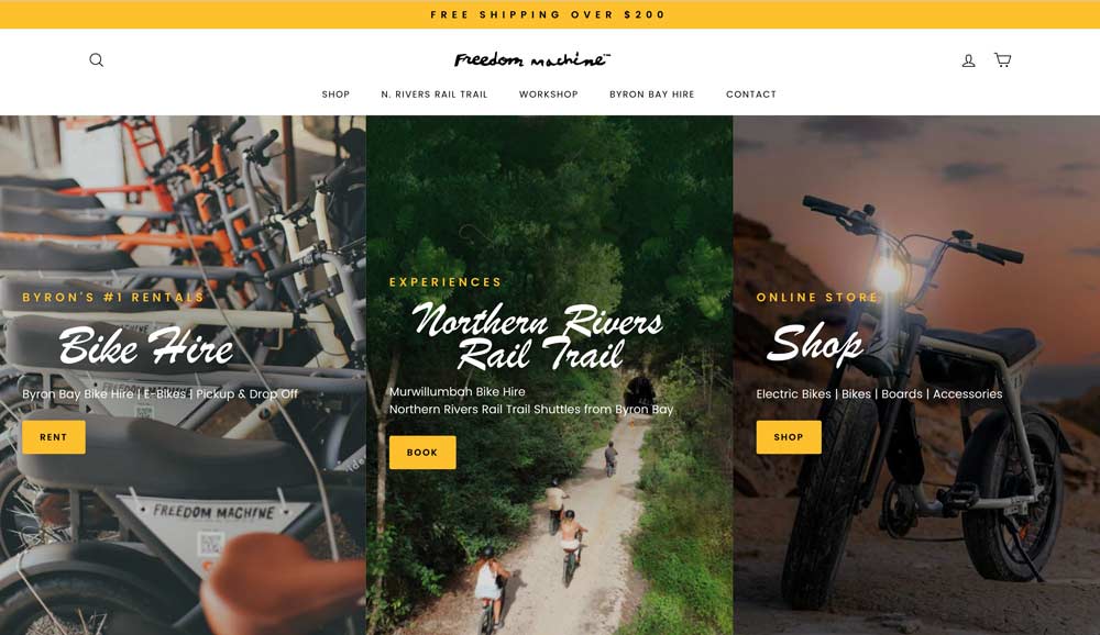Freedom Machine homepage layout showing Bike Hire, Northern Rivers Rail Trail and Shop pathways